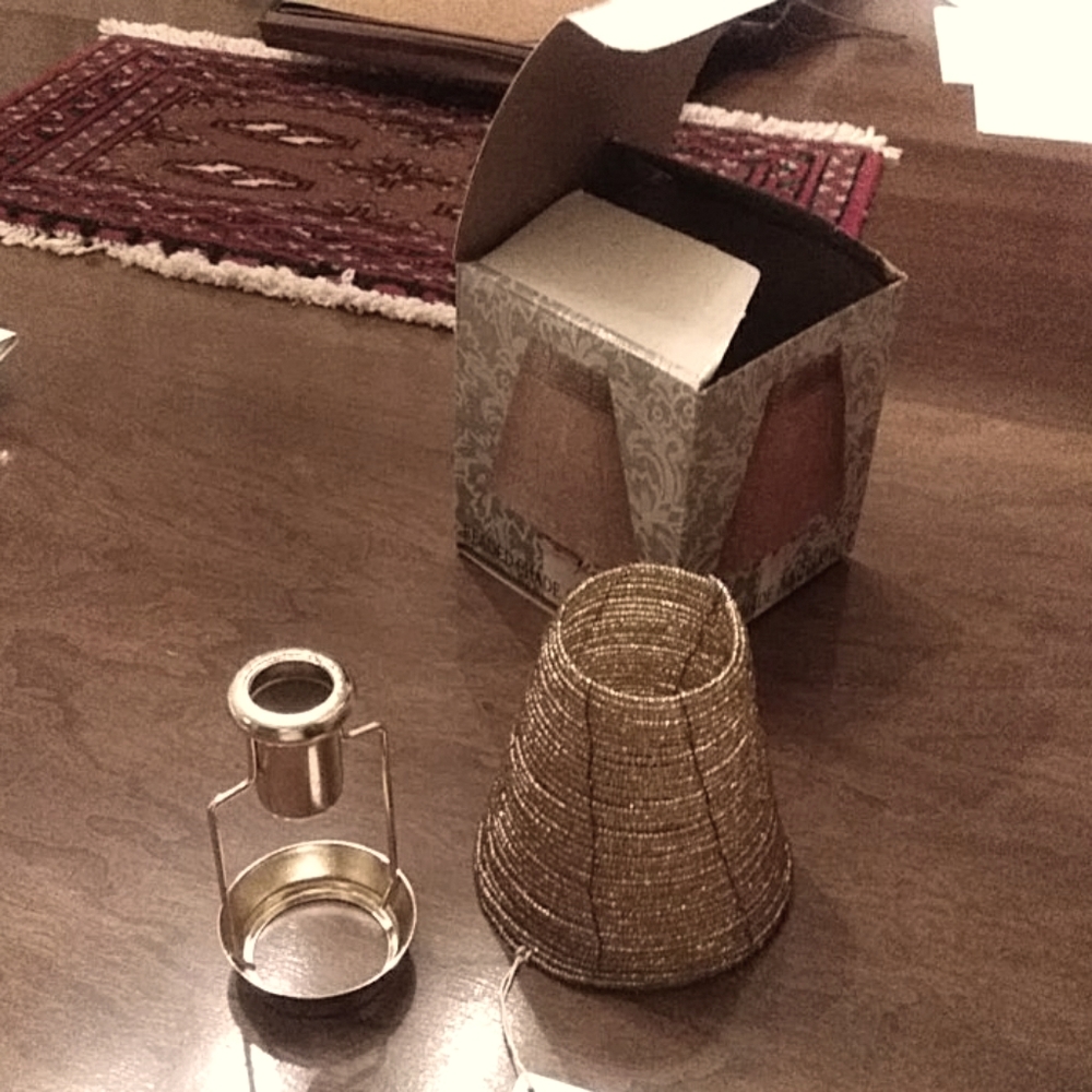 Beaded shade and metal candle follower